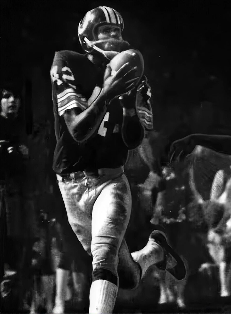 A player catching a pass during an RFK football game